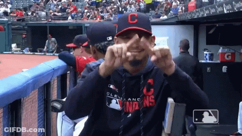 A Man Wearing A Cleveland Indians Sweatshirt Makes A Funny Face GIF