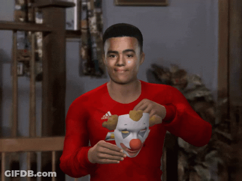 A Man Wearing A Clown Mask And A Red Chevrolet Shirt GIF