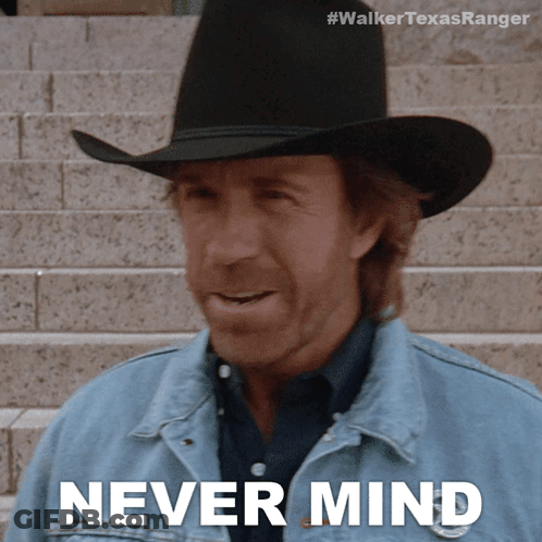 A Man Wearing A Cowboy Hat And A Denim Jacket Says Never Mind GIF