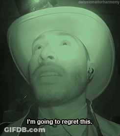 A Man Wearing A Cowboy Hat And Ear Buds Says I 'M Going To Regret This GIF