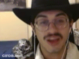 A Man Wearing A Cowboy Hat And Glasses Is Talking GIF