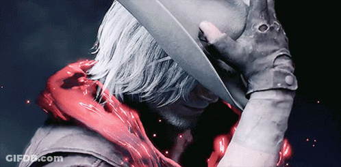 A Man Wearing A Cowboy Hat And Gloves GIF