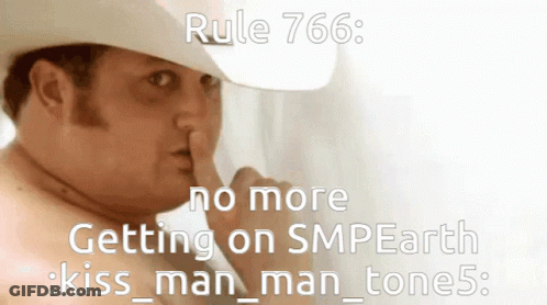A Man Wearing A Cowboy Hat Is Making A Silence Gesture GIF