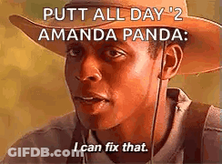 A Man Wearing A Cowboy Hat Is Talking To A Panda . GIF