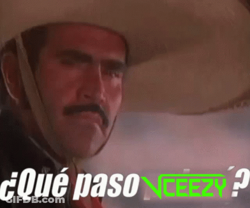 A Man Wearing A Cowboy Hat Says " Qué Paso " In Green Letters GIF