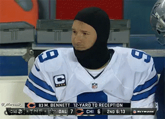 A Man Wearing A Cowboys Jersey And A Ski Mask GIF