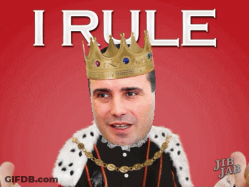 A Man Wearing A Crown And A King 'S Robe With The Word I Rule Above Him GIF