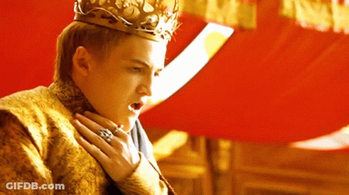 A Man Wearing A Crown And A Ring On His Finger GIF