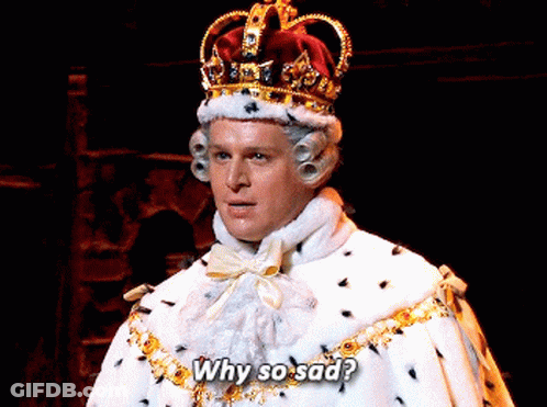 A Man Wearing A Crown And A Robe Says " Why So Sad " GIF