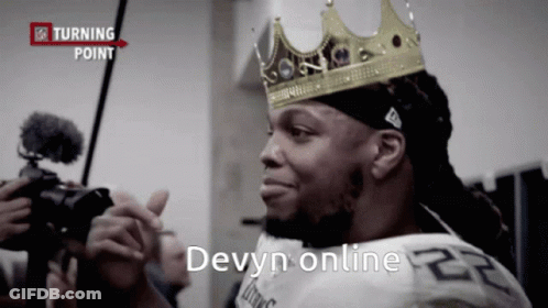 A Man Wearing A Crown With The Words Devyn Online Written Below Him GIF