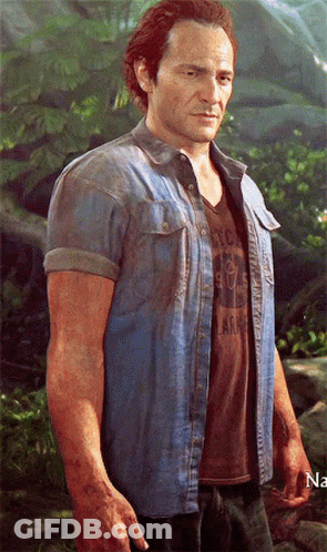 A Man Wearing A Denim Shirt And A Brown T-Shirt With The Word Army On The Front GIF