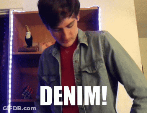 A Man Wearing A Denim Shirt With The Word Denim Written On It GIF
