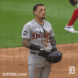 A Man Wearing A Detroit Jersey Holds His Hand To His Mouth GIF