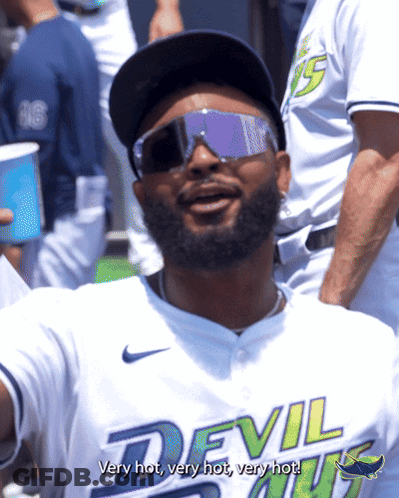 A Man Wearing A Devils Jersey And Sunglasses Says Very Hot Very Hot Very Hot GIF