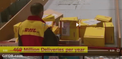 A Man Wearing A Dhl Jacket Is Standing In Front Of A Bunch Of Boxes GIF