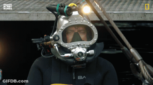 A Man Wearing A Diving Suit With The Letter Ba On The Front GIF