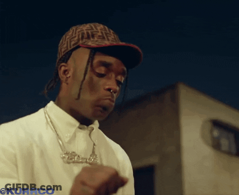 A Man Wearing A Fendi Hat And A Necklace With The Word Kurrco Below Him GIF
