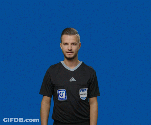 A Man Wearing A Fifa Referee Jersey Holds Up His Fingers GIF