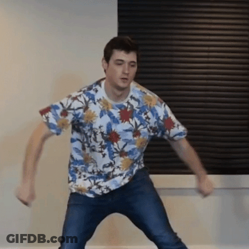 Man Dancing In Floral Shirt And Jeans GIF