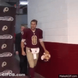 A Man Wearing A Football Jersey With The Number 8 On It GIF