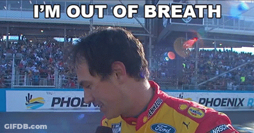 A Man Wearing A Ford Shirt Is Talking Into A Microphone GIF