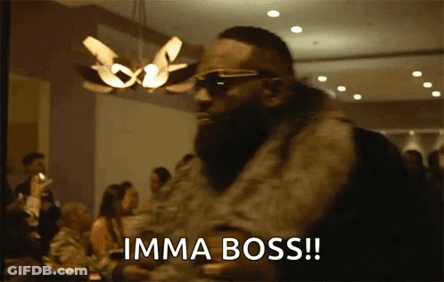 A Man Wearing A Fur Coat And Sunglasses Says Imma Boss GIF