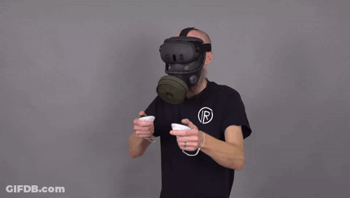 A Man Wearing A Gas Mask And A Shirt That Says Ur On It GIF
