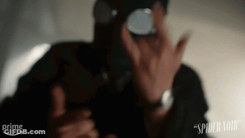 A Man Wearing A Gas Mask Is Taking A Picture Of Himself With A Prime Arrow Behind Him GIF