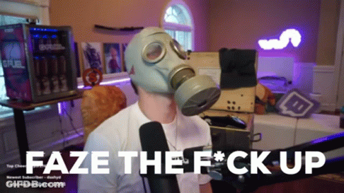 A Man Wearing A Gas Mask Says " Faze The F * Ck Up " While Sitting In Front Of A Microphone GIF