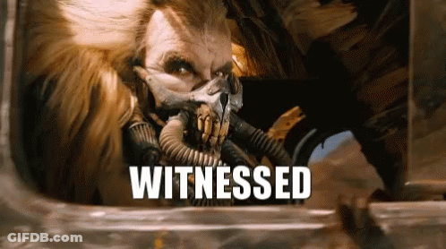 A Man Wearing A Gas Mask With The Word Witnessed Written Below Him GIF