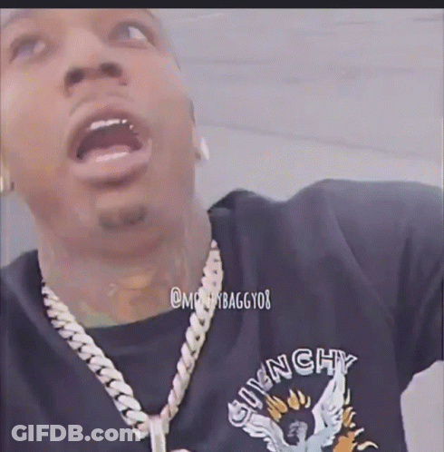 A Man Wearing A Givenchy T-Shirt And A Necklace GIF