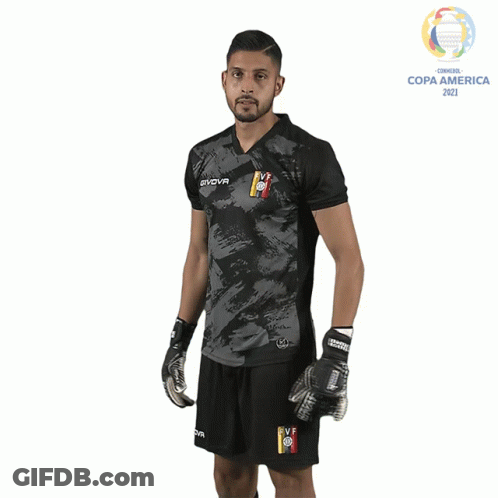 A Man Wearing A Givova Shirt And Shorts GIF