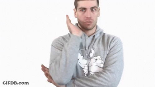 A Man Wearing A Gray Hoodie With A Cartoon Bear On It GIF