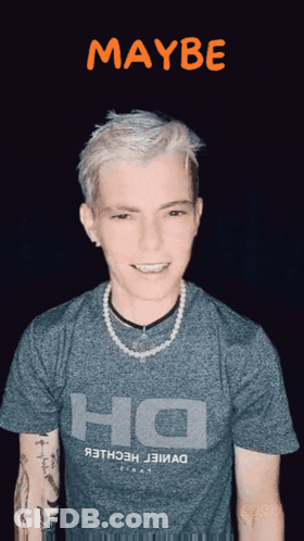 A Man Wearing A Gray Shirt That Says Ho On It GIF