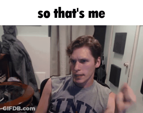 A Man Wearing A Gray Tank Top With The Word Tnt On The Front GIF