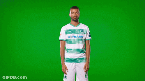 A Man Wearing A Green And White Hofmann Shirt GIF