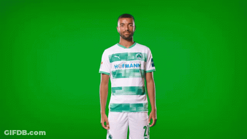 A Man Wearing A Green And White Hofmann Soccer Jersey GIF