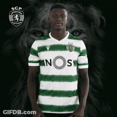 A Man Wearing A Green And White Striped Shirt That Says Nos On It GIF