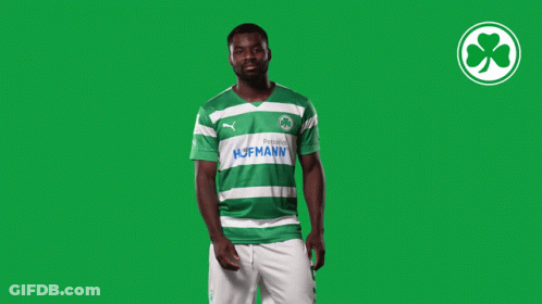 A Man Wearing A Green And White Striped Shirt With Hofmann Written On It GIF