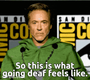 A Man Wearing A Green Cape Says So This Is What Going Deaf Feels Like GIF
