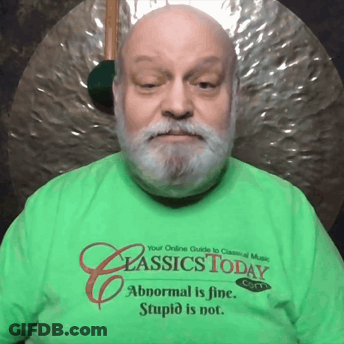 A Man Wearing A Green Classics Today T-Shirt GIF