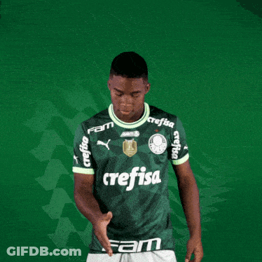 A Man Wearing A Green Crefisa Jersey Shakes Hands GIF