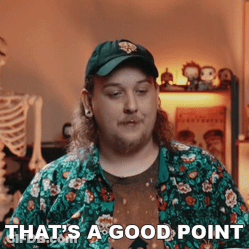A Man Wearing A Green Hat And A Floral Shirt Says That 'S A Good Point GIF