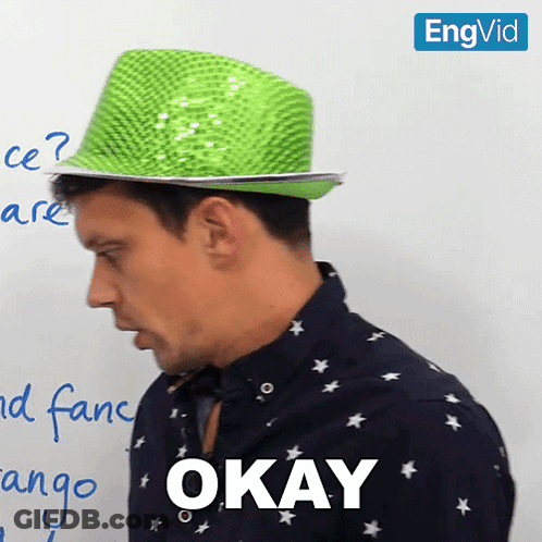 Green Hat Man Says Okay GIF