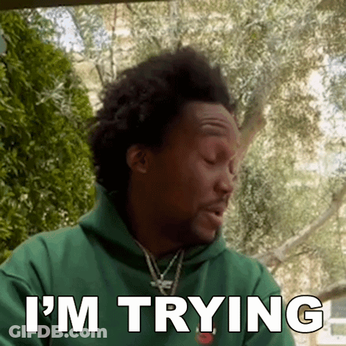 A Man Wearing A Green Hoodie Says I 'M Trying GIF