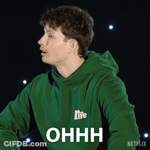 A Man Wearing A Green Hoodie That Says Life On It GIF
