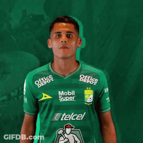 A Man Wearing A Green Jersey That Says Mobil Super GIF