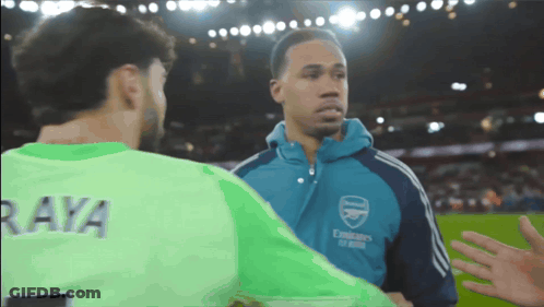 A Man Wearing A Green Jersey That Says Raya On It GIF