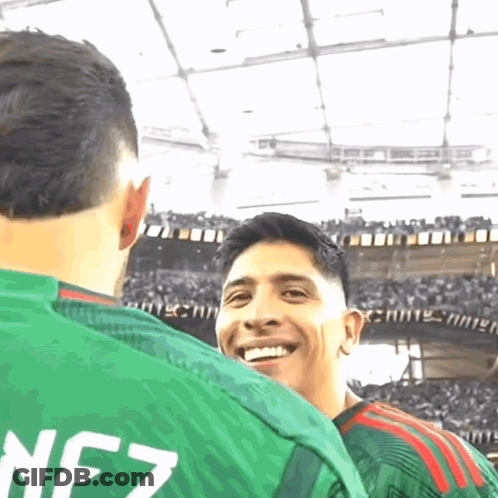 A Man Wearing A Green Jersey With Nfz On The Back GIF
