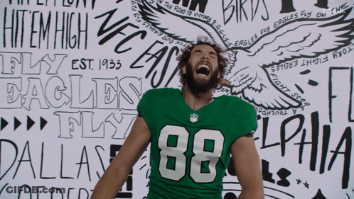 A Man Wearing A Green Jersey With The Number 09 GIF